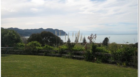 Looking out over a bay, across a lawn