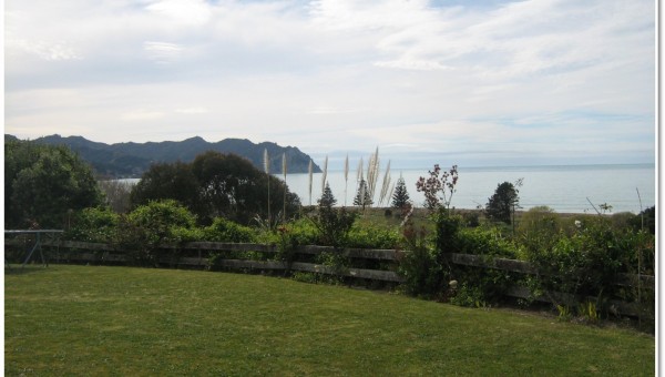 Looking out over a bay, across a lawn