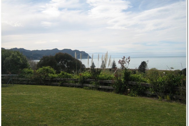 Looking out over a bay, across a lawn